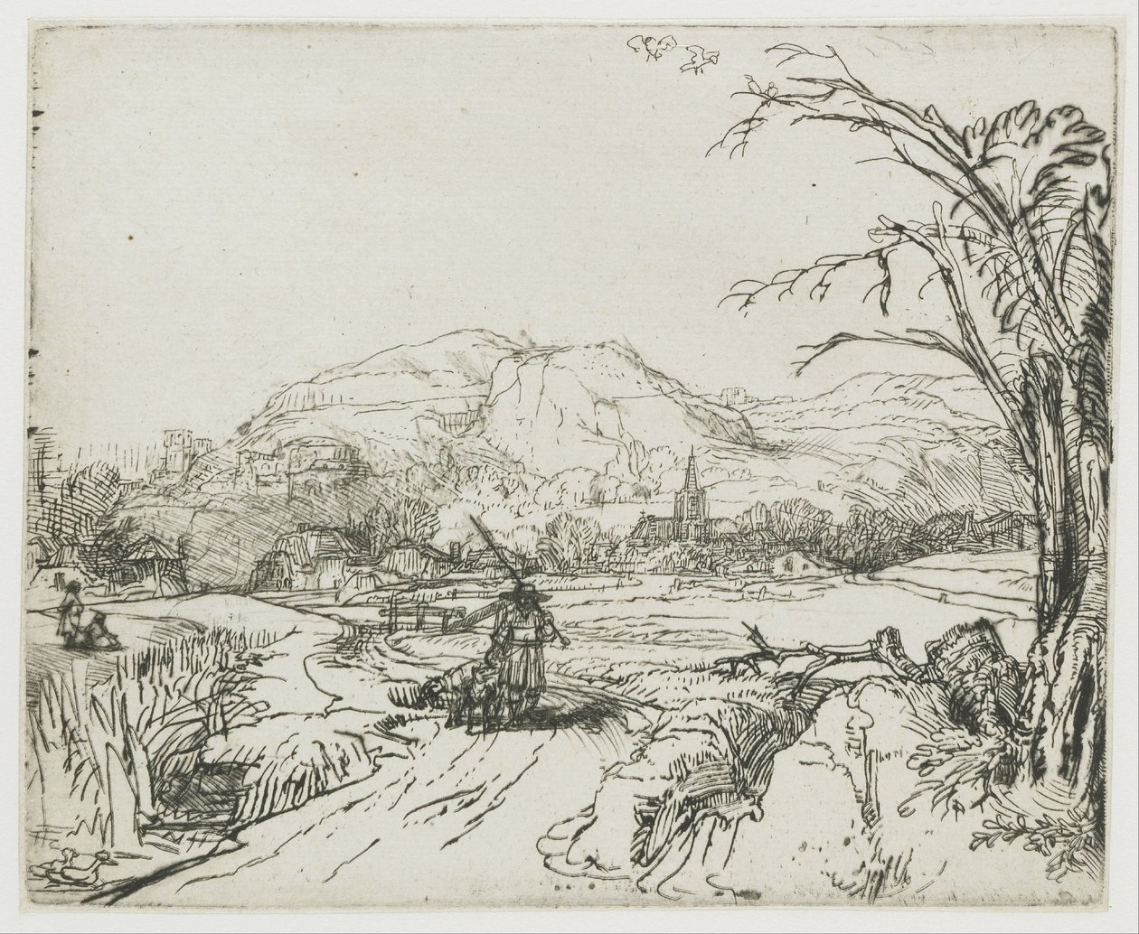 Paisaje con un deportista y unos perros de Rembrandt van Rijn