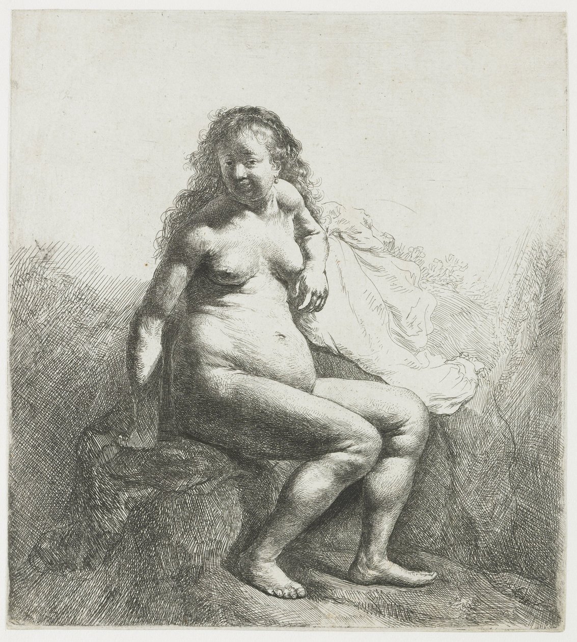 Mujer desnuda en un montículo de Rembrandt van Rijn