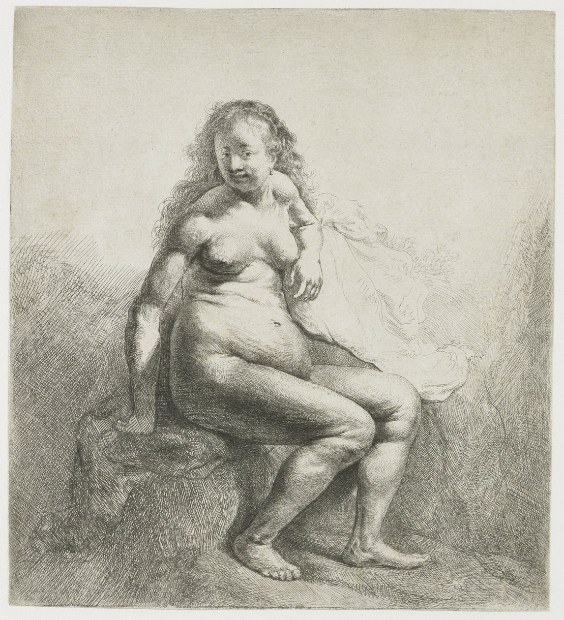Mujer desnuda en un montículo de Rembrandt van Rijn