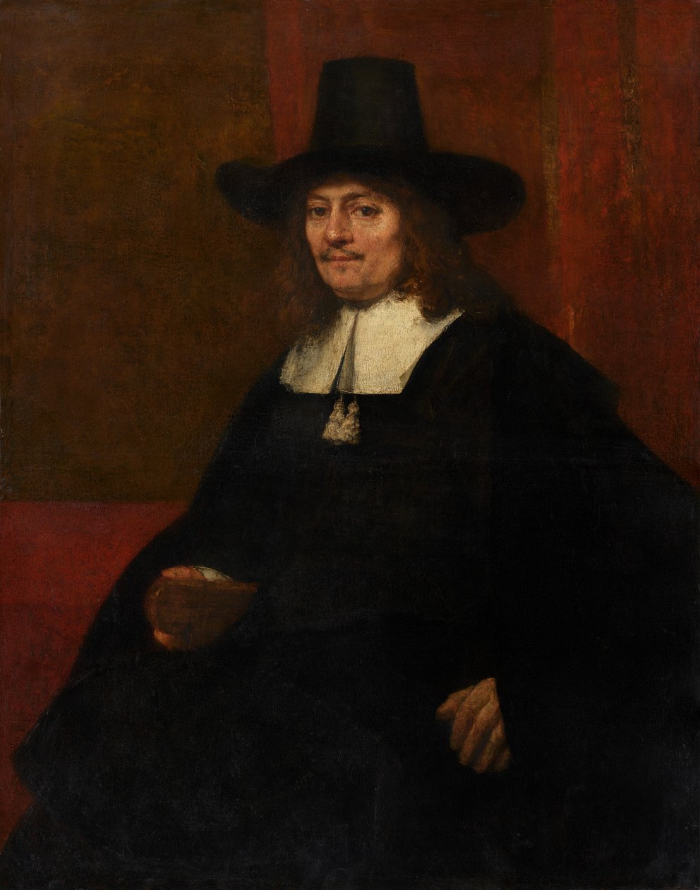 Retrato de un hombre con sombrero alto de Rembrandt van Rijn