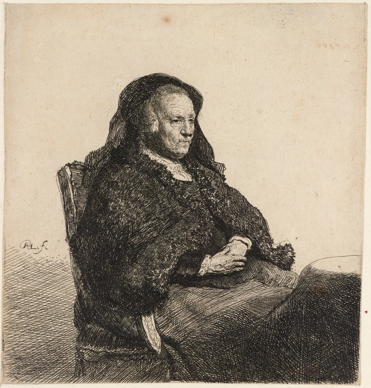 La madre del artista sentada en una mesa de Rembrandt van Rijn