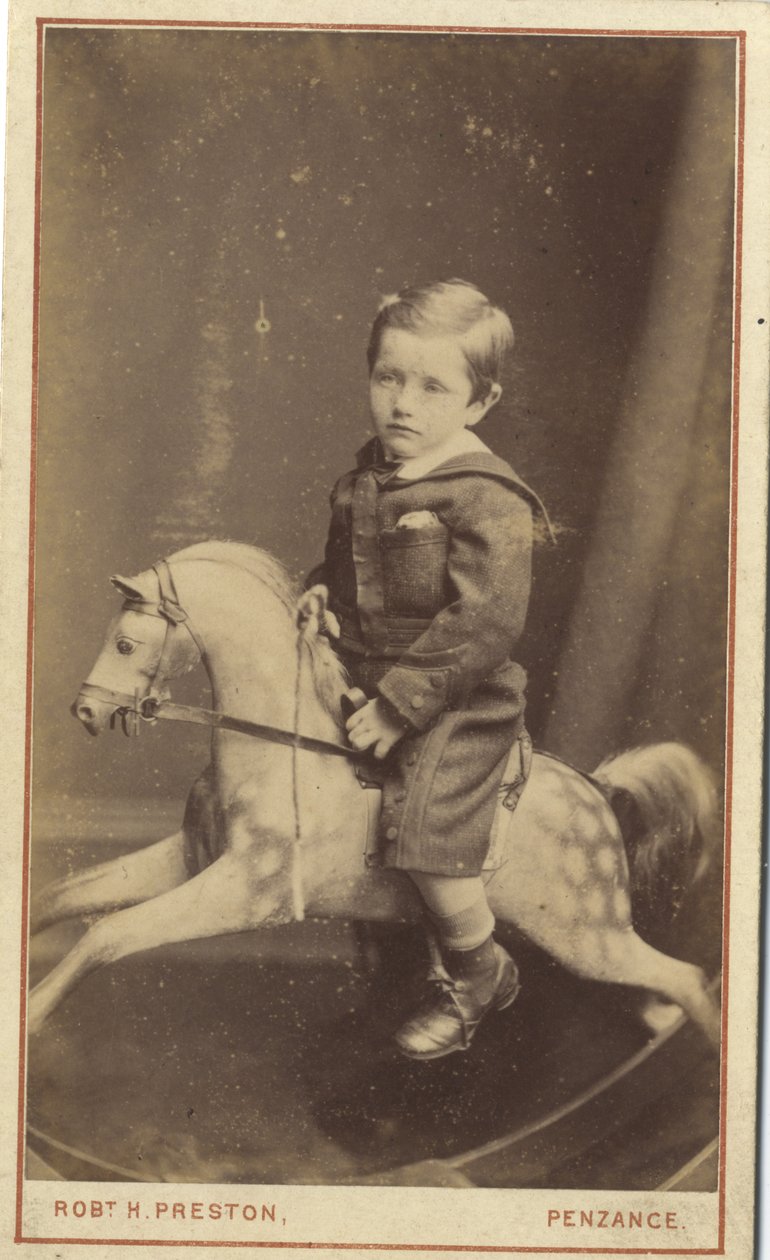 Niño sentado en un caballo de juguete, 1870s de Robert H. Preston
