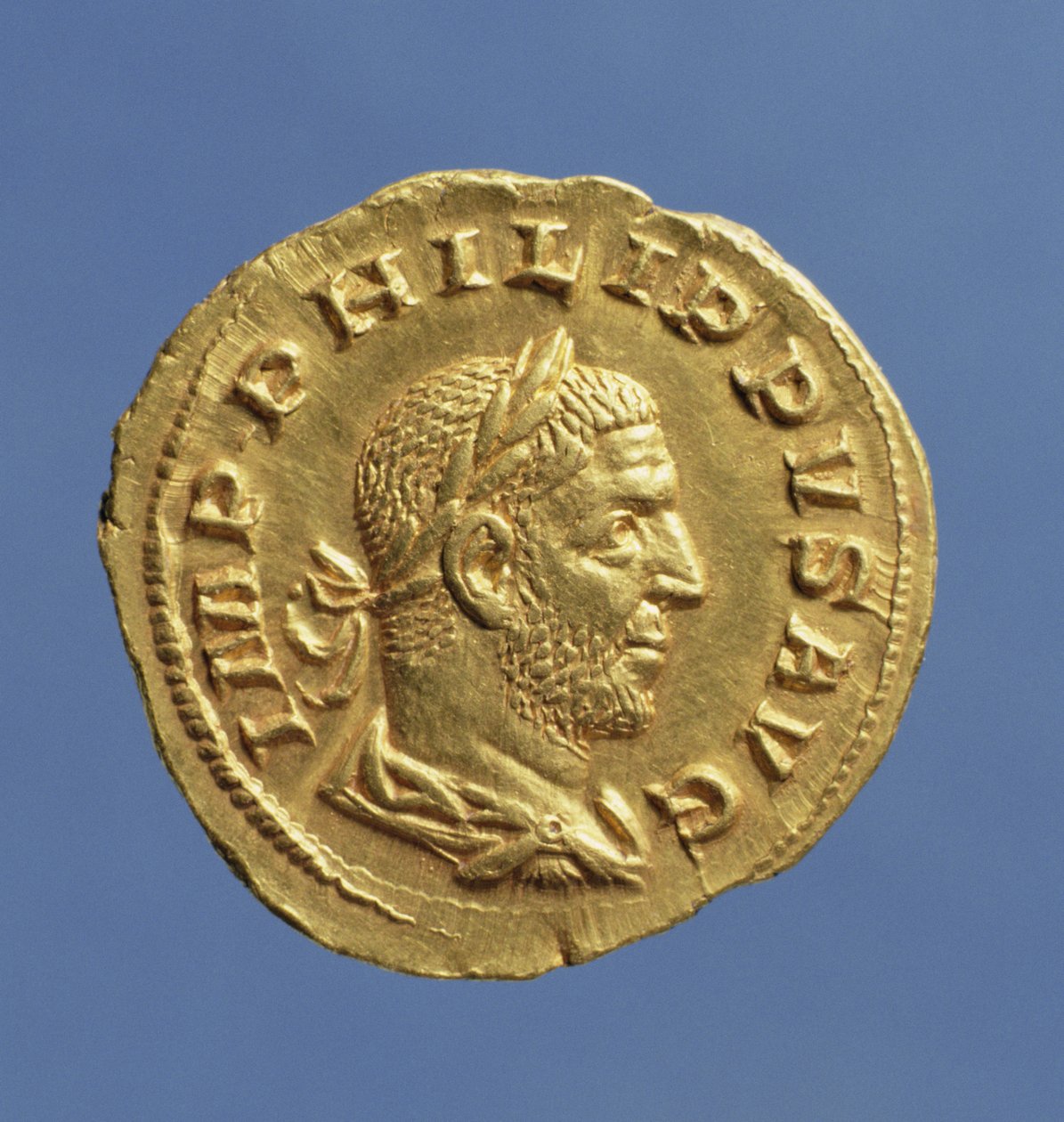 Aureus (anverso) de Felipe el Árabe (244-249) con toga, coraza y corona de laurel. Inscripción: IMP PHILIPPVS AVG de Roman