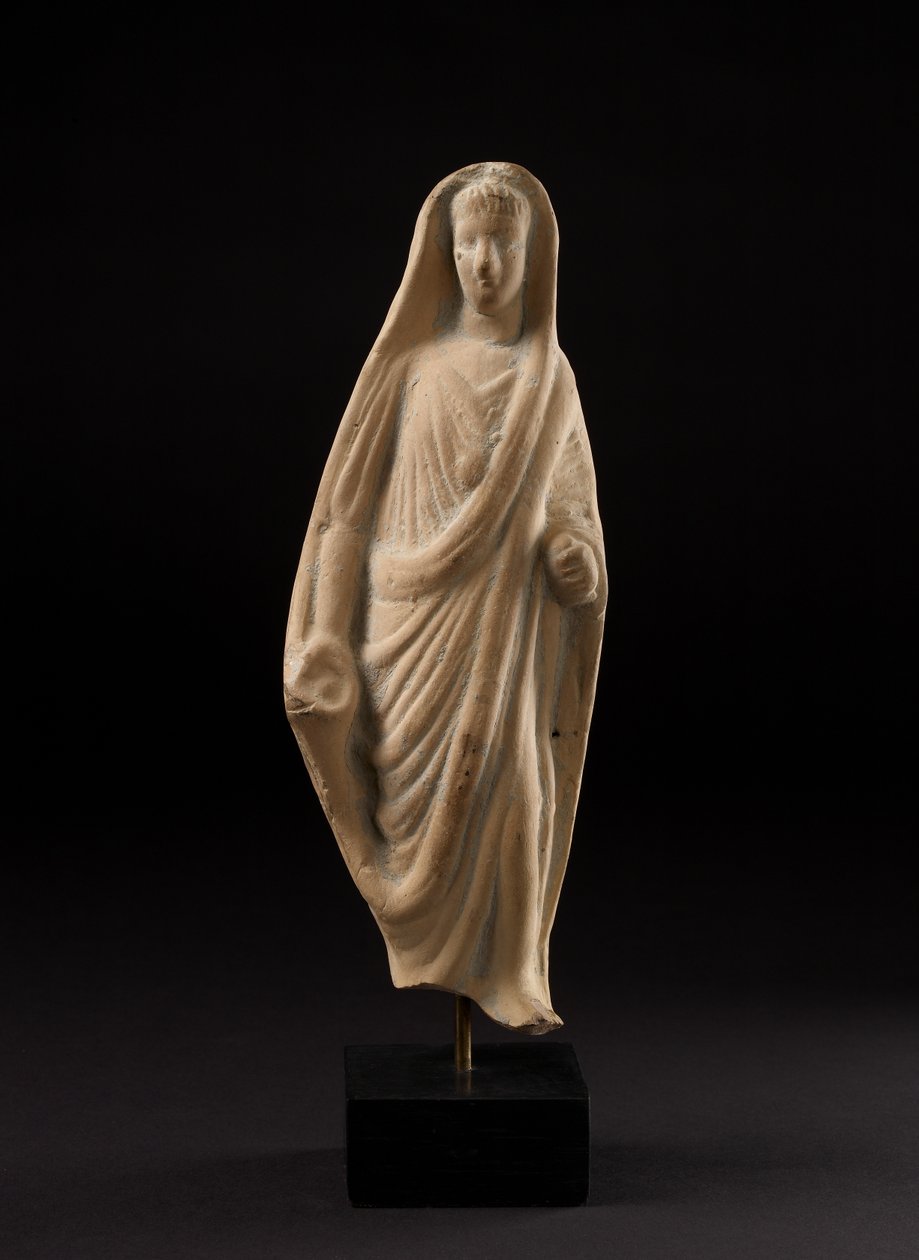 Estatuilla de terracota de un romano piadoso cubriéndose la cabeza con su toga de Roman