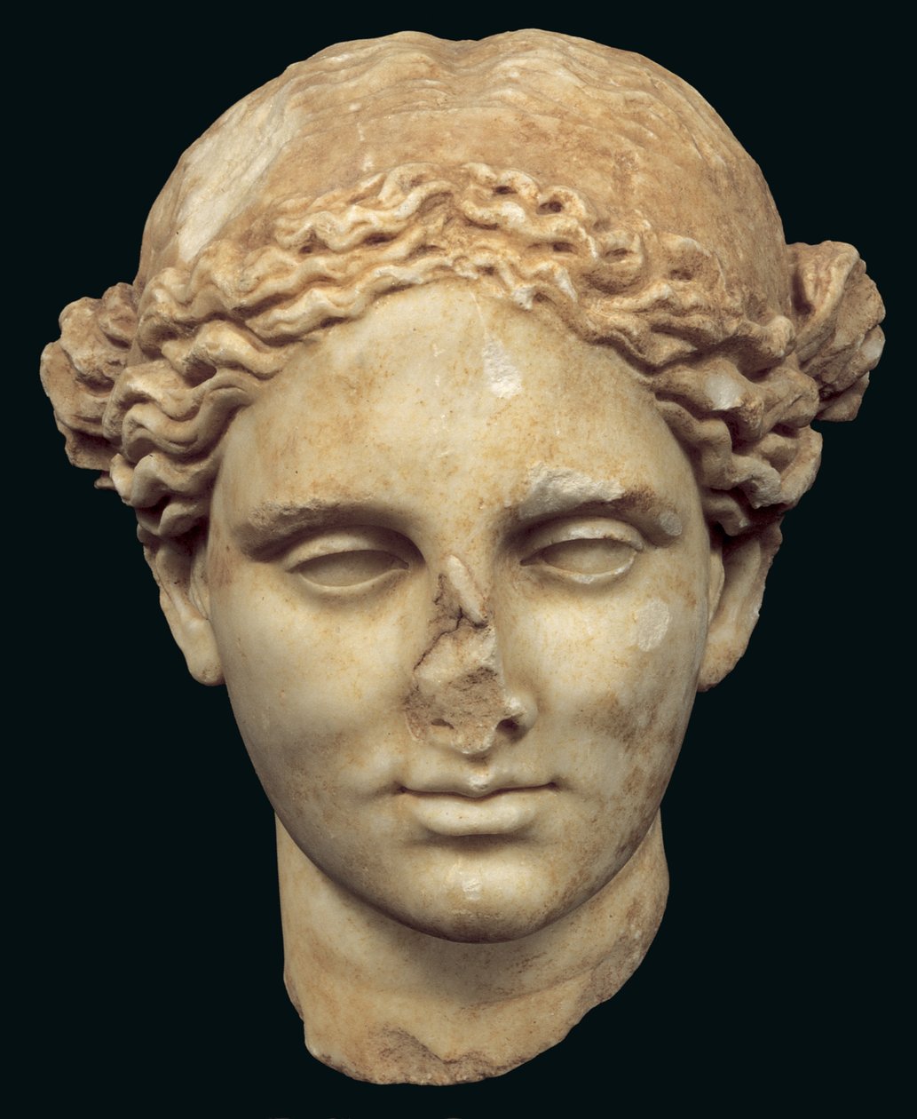Cabeza de Apolo Sauroktonos (el asesino de lagartos) copia de un bronce griego del siglo IV por Praxiteles, encontrado en Kifissia de Roman