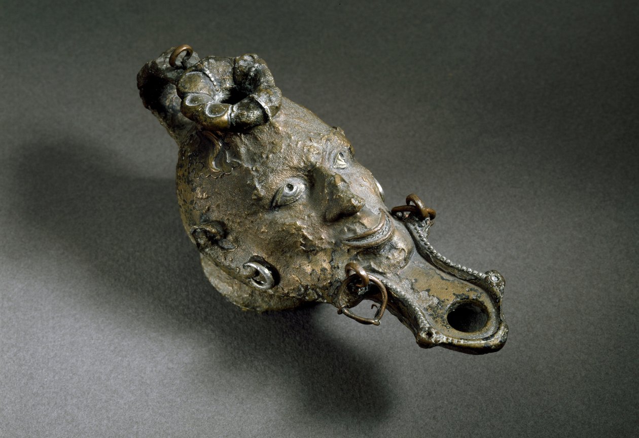 Lámpara de aceite romana en forma de cara. Siglo I o II d.C. España Museo de Ampurias (Empurias) de Roman
