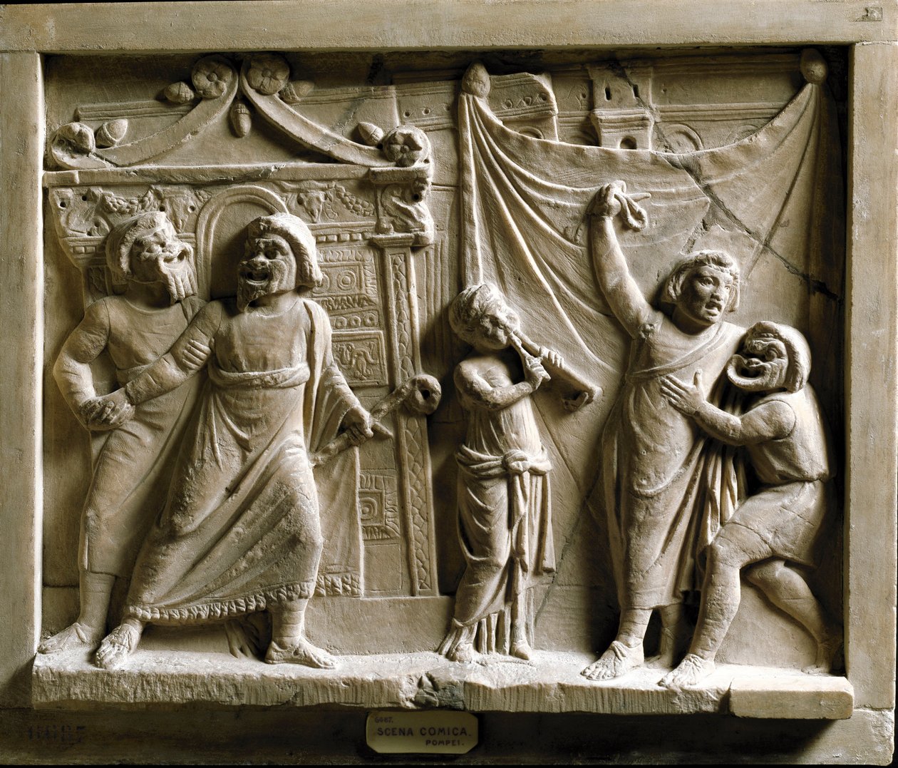 Arte romano: escena de teatro de comedia de la obra “Andria” de Terencio (Publius Terentius Afer) (185-159 a.C.), relieve de Pompeya - Museo Arqueológico Nacional de Nápoles de Roman