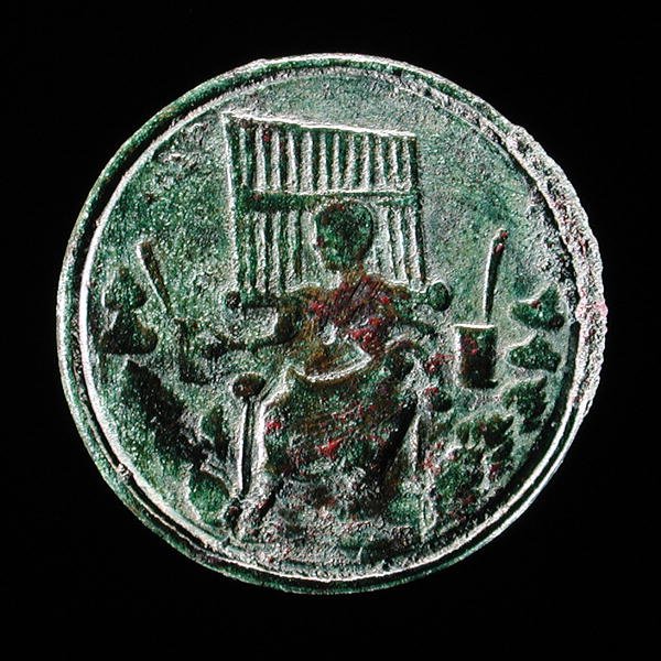 Moneda romana que representa un órgano de Roman
