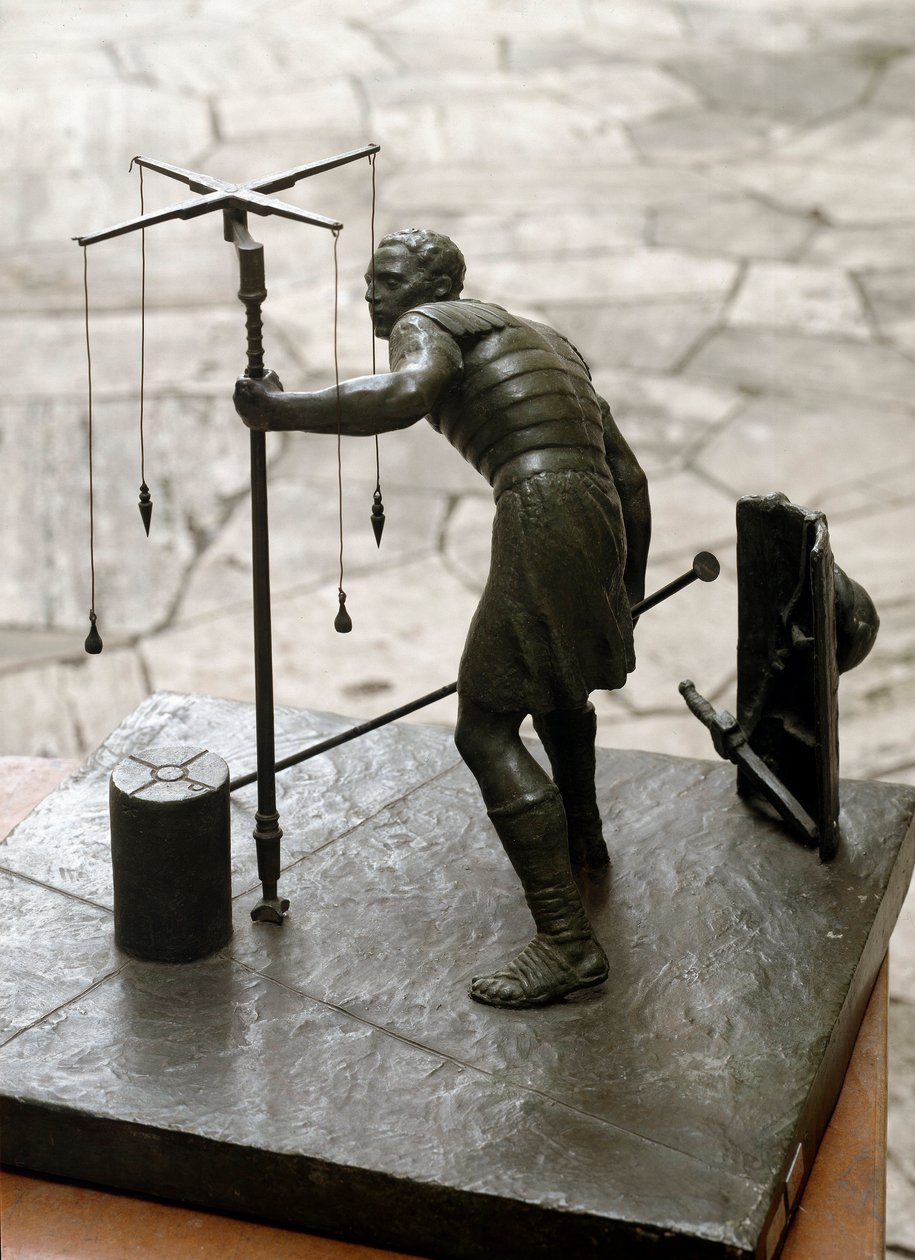 Arte romano: el gromatician. Un topógrafo mide la tierra usando una groma. Escultura de bronce de Roman Roman