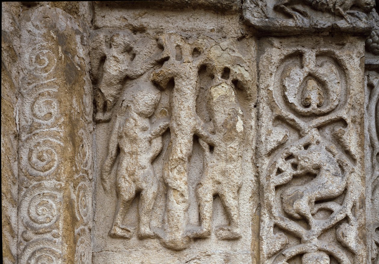 Adán y Eva. Detalle de la fachada de la Basílica, principios del siglo XII de Romanesque