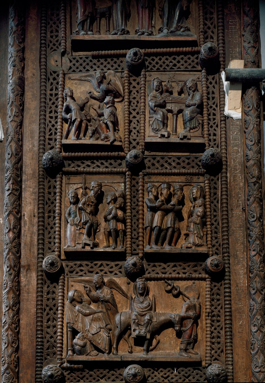 Arte románico: puerta de madera de mediados del siglo XII de la Iglesia de Santa María del Capitolio en Colonia, Alemania (Sankt Maria im Kapitol, Köln). Escenas que representan el anuncio a los pastores, la natividad, la adoración de los magos y la de Romanesque