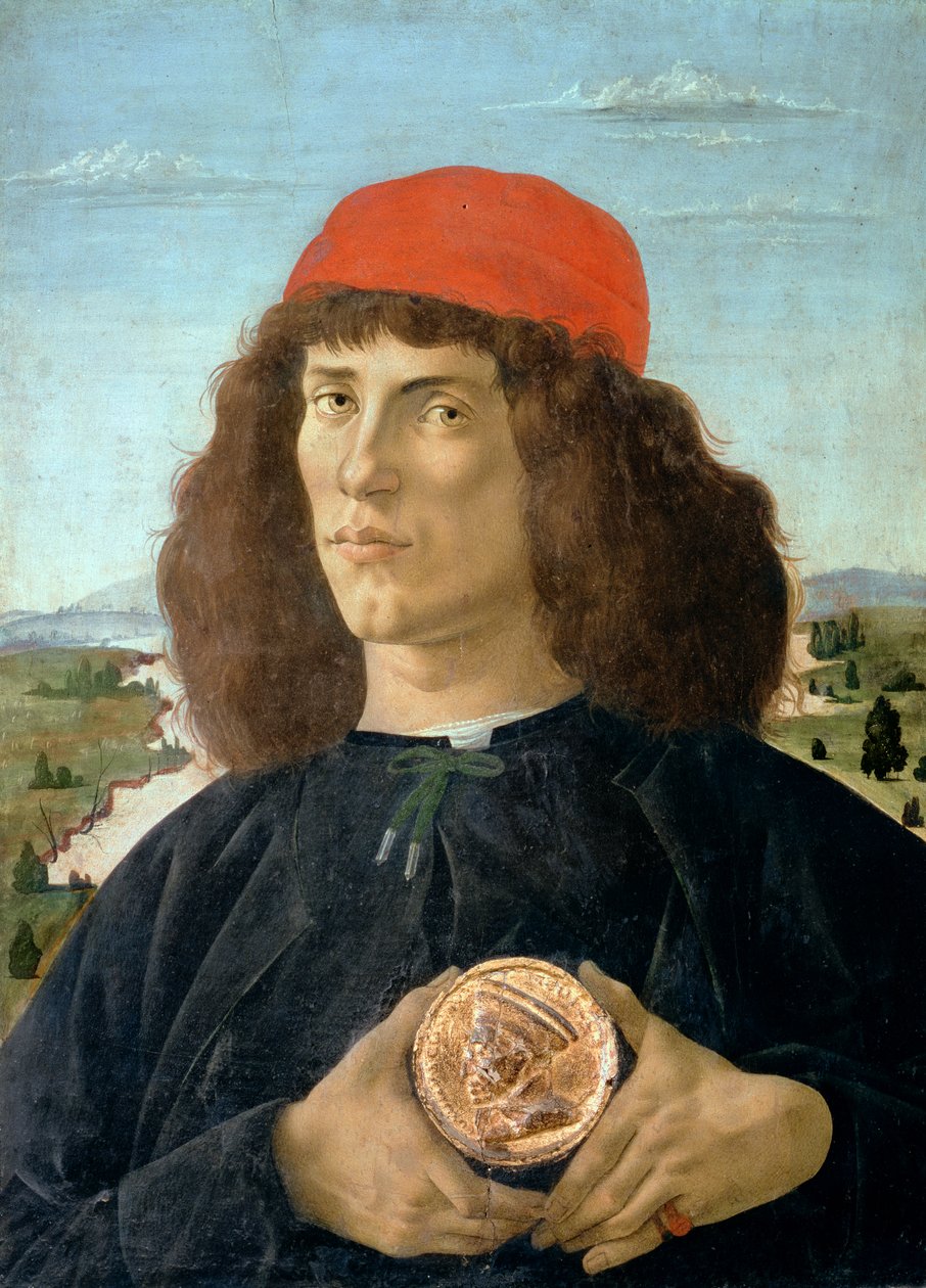 Retrato de un joven sosteniendo un medallón de Cosimo I de