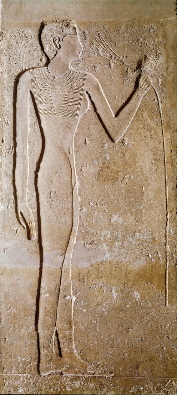 Antigüedad egipcia: joven mujer con flor de loto. Piedra caliza. V dinastía, 2300 a.C. Dim. 145 cm París, Museo del Louvre de School Egyptian
