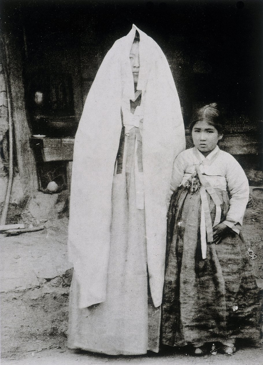 Mujer coreana y niña de School Korean