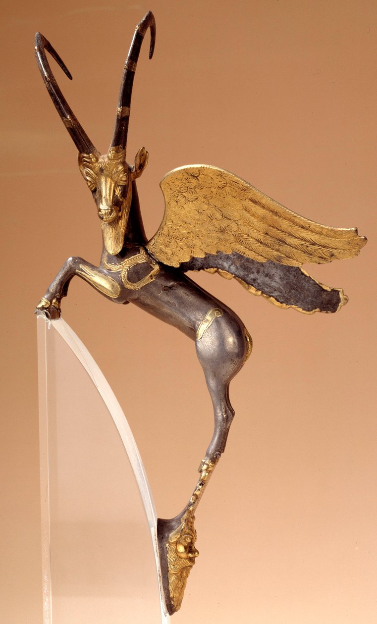 Asa de aparato: ibex de ala de plata, con incrustaciones de oro. Routenide de época persa (siglos VI-IV a.C.), procede de Irán. París, musee du Louvre - Asa ceremonial: íbice alado de plata, con incrustaciones de oro. Período persa aqueménida (siglos VI-IV de School Persian