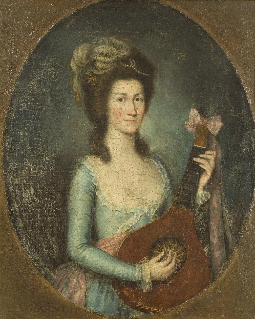 Dama tocando una guitarra de Spanish School