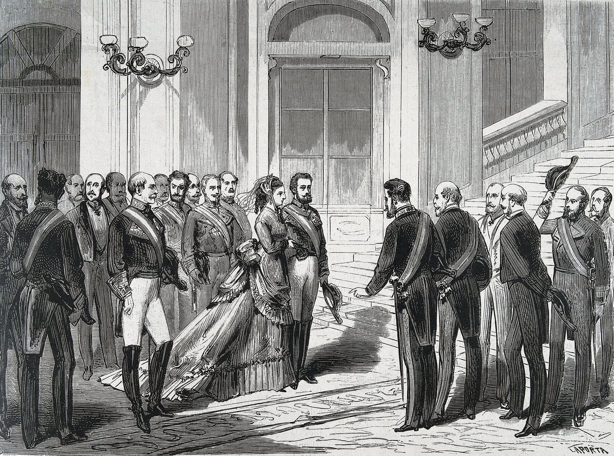 El Rey de España Amadeo I (Amedeo Ferdinando Maria di Savoia) y su esposa la Reina María Victoria dal Pozzo della Cisterna a su llegada al Palacio Real en Madrid el 19/03/1871. Grabado de "La Ilustración Española y Americana" de Spanish School