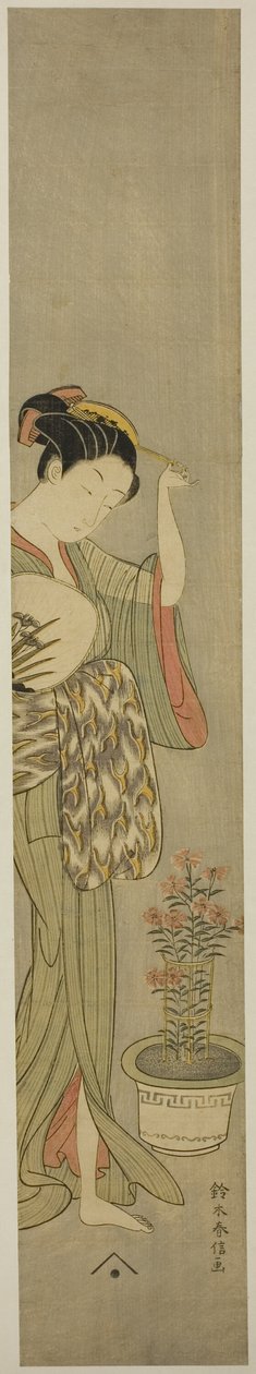 Belleza ajustando su horquilla de Suzuki Harunobu