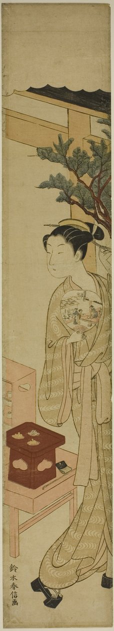 La camarera Osen de la casa de té Kagiya sosteniendo un abanico de Suzuki Harunobu