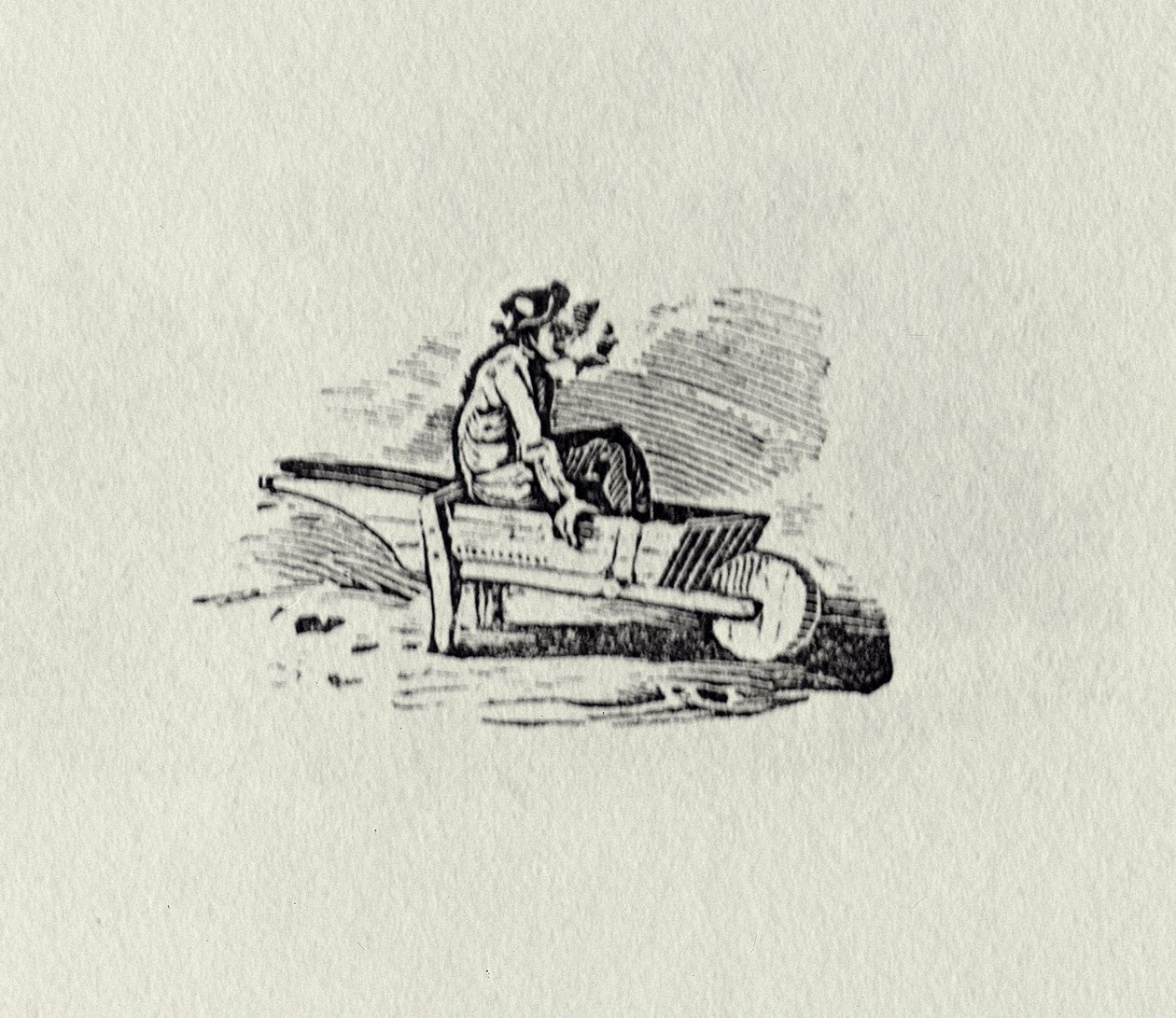 Un hombre en una carretilla de 