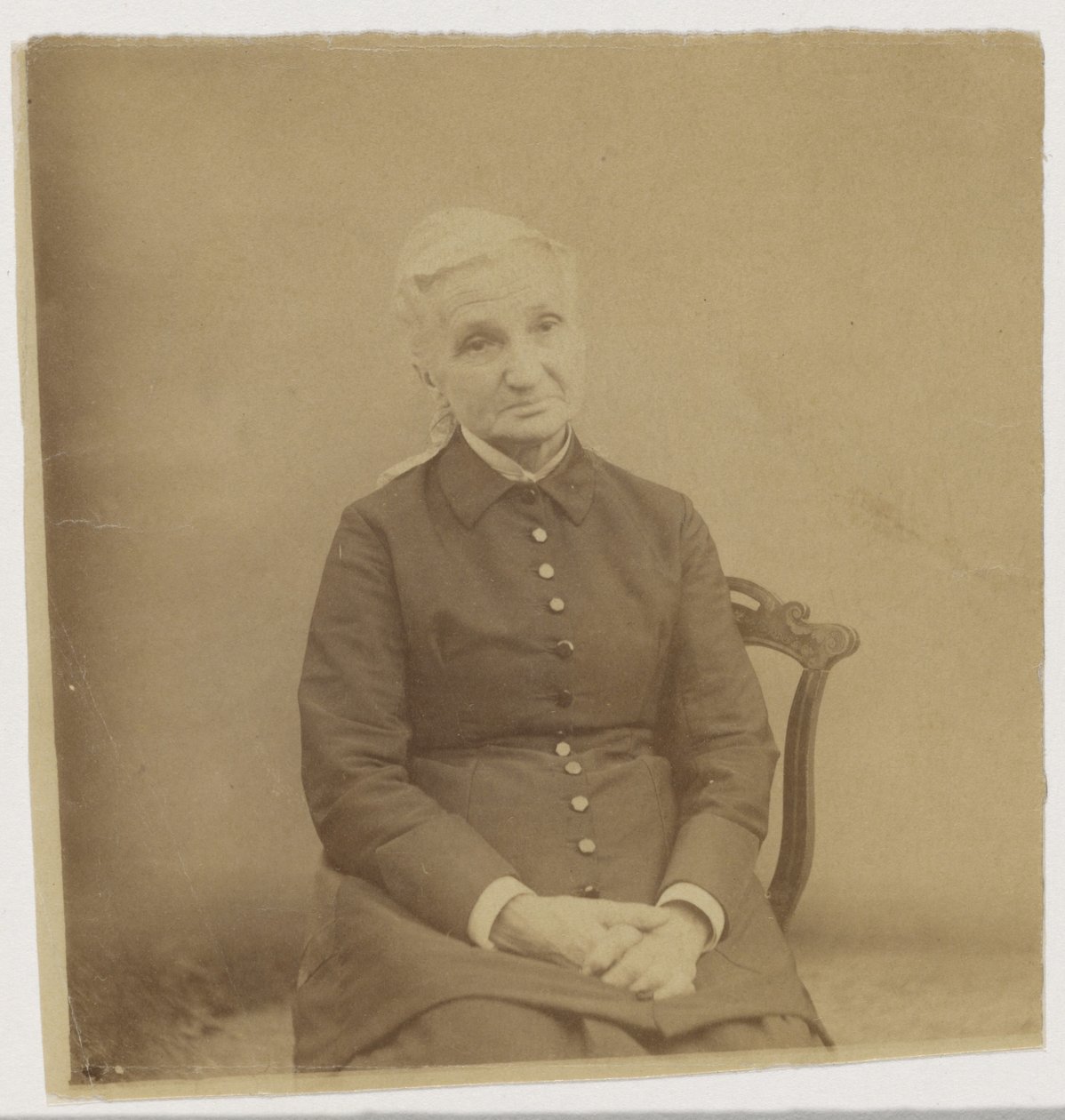 Retrato de una mujer mayor sentada de Thomas Eakins