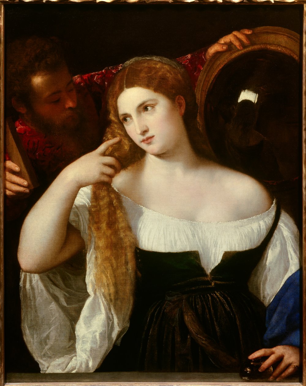 Retrato de una mujer con su tocador de Tiziano Vecelli