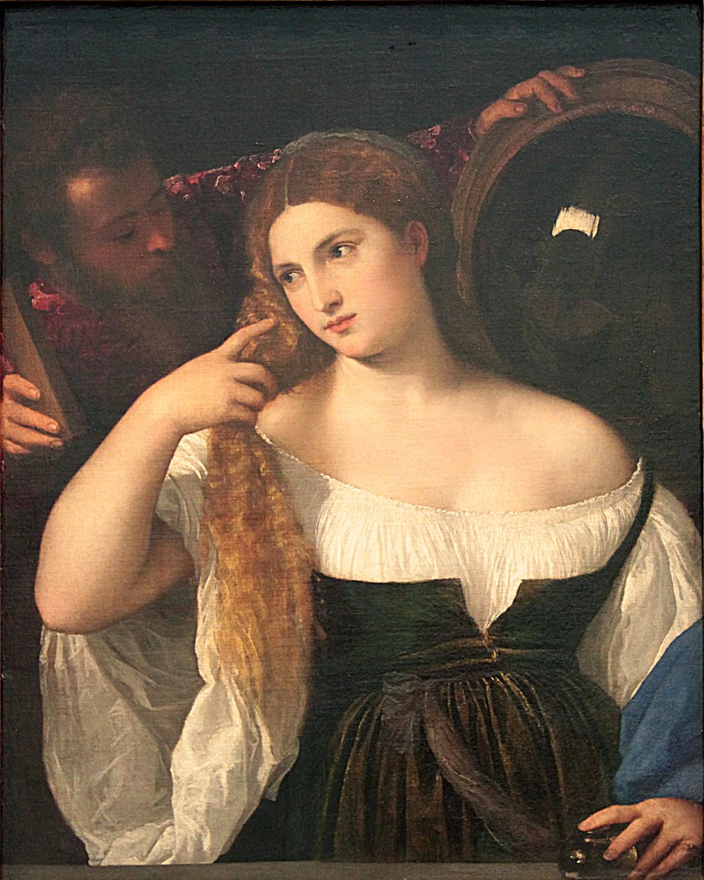 En francés:  La Femme au miroir Mujer con espejo de Titian