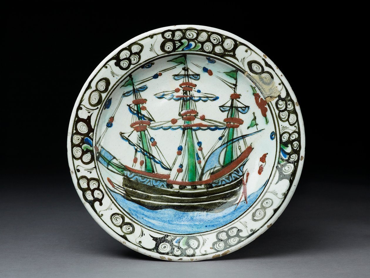 Plato de pasta de piedra con decoración bajo vidriado, Iznik, c.1620-30 de Turkish School
