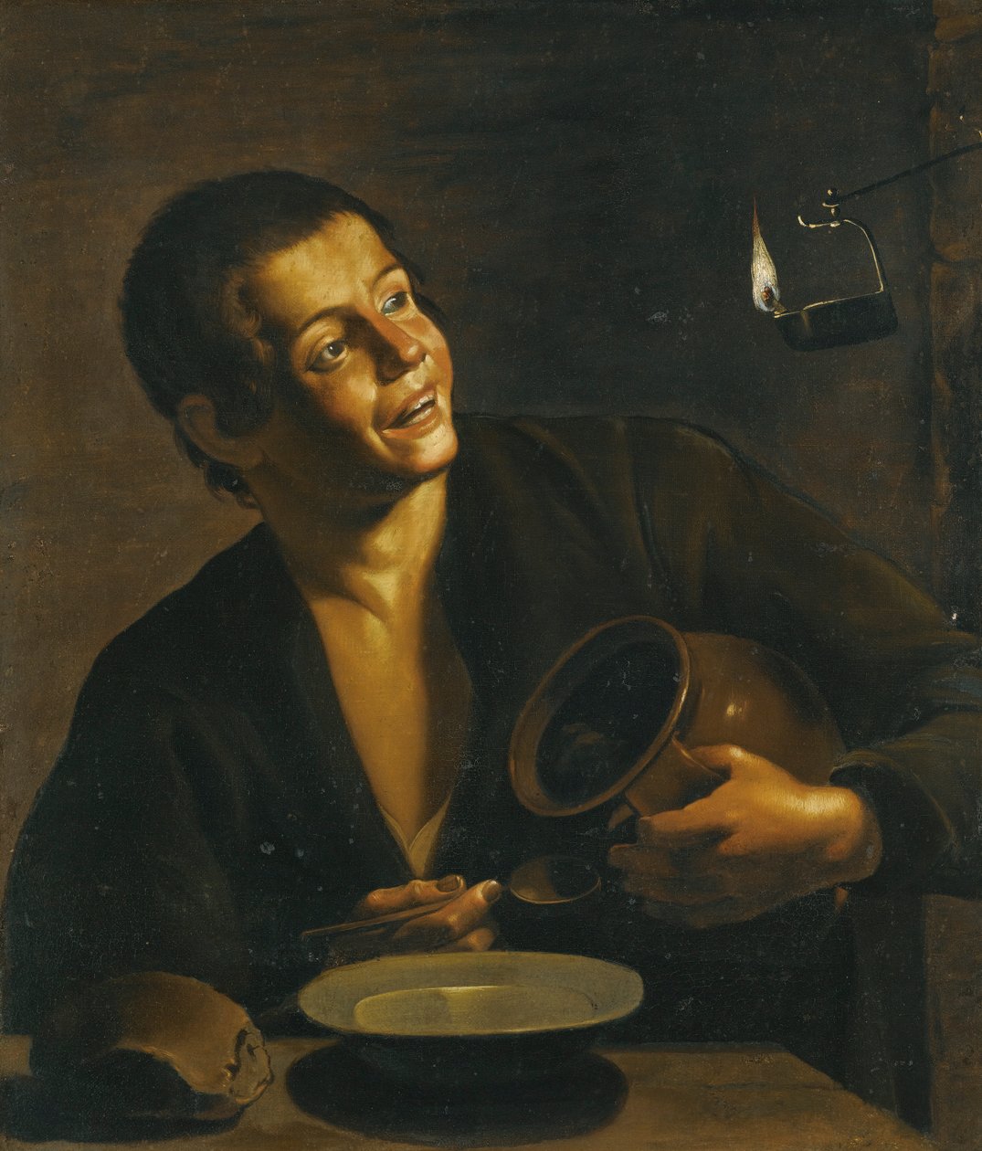 Un joven comiendo a la luz de una lámpara de aceite de Unbekannt Unbekannt