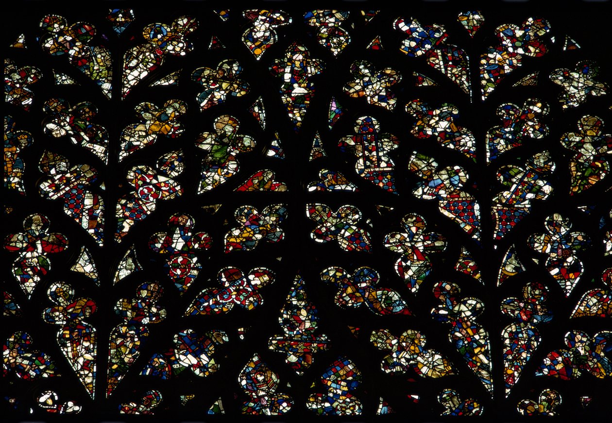 Patrones abstractos de fragmentos de vidrio del siglo XIII en la ventana del ojo del Obispo, el rosetón sur de Unbekannt Unbekannt