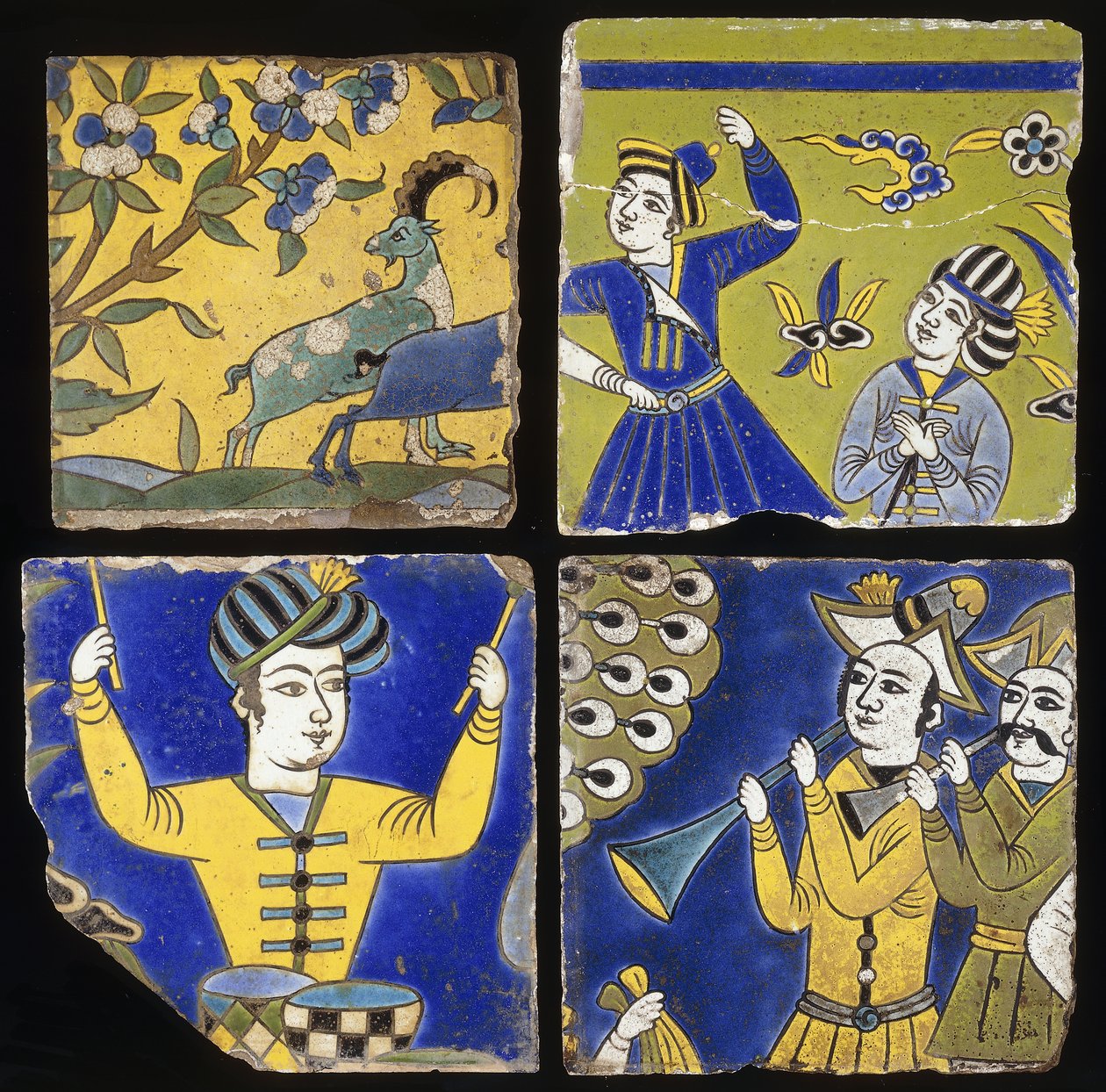 Cuatro azulejos Saffavid cuerda seca, que representan dos íbices y las figuras de músicos y bailarines, c. 1600 de Unbekannt
