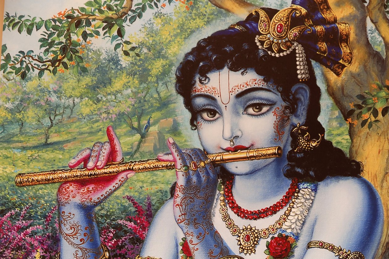 Pintura que representa al dios hindú Krishna tocando una flauta al aire libre, India de Unbekannt