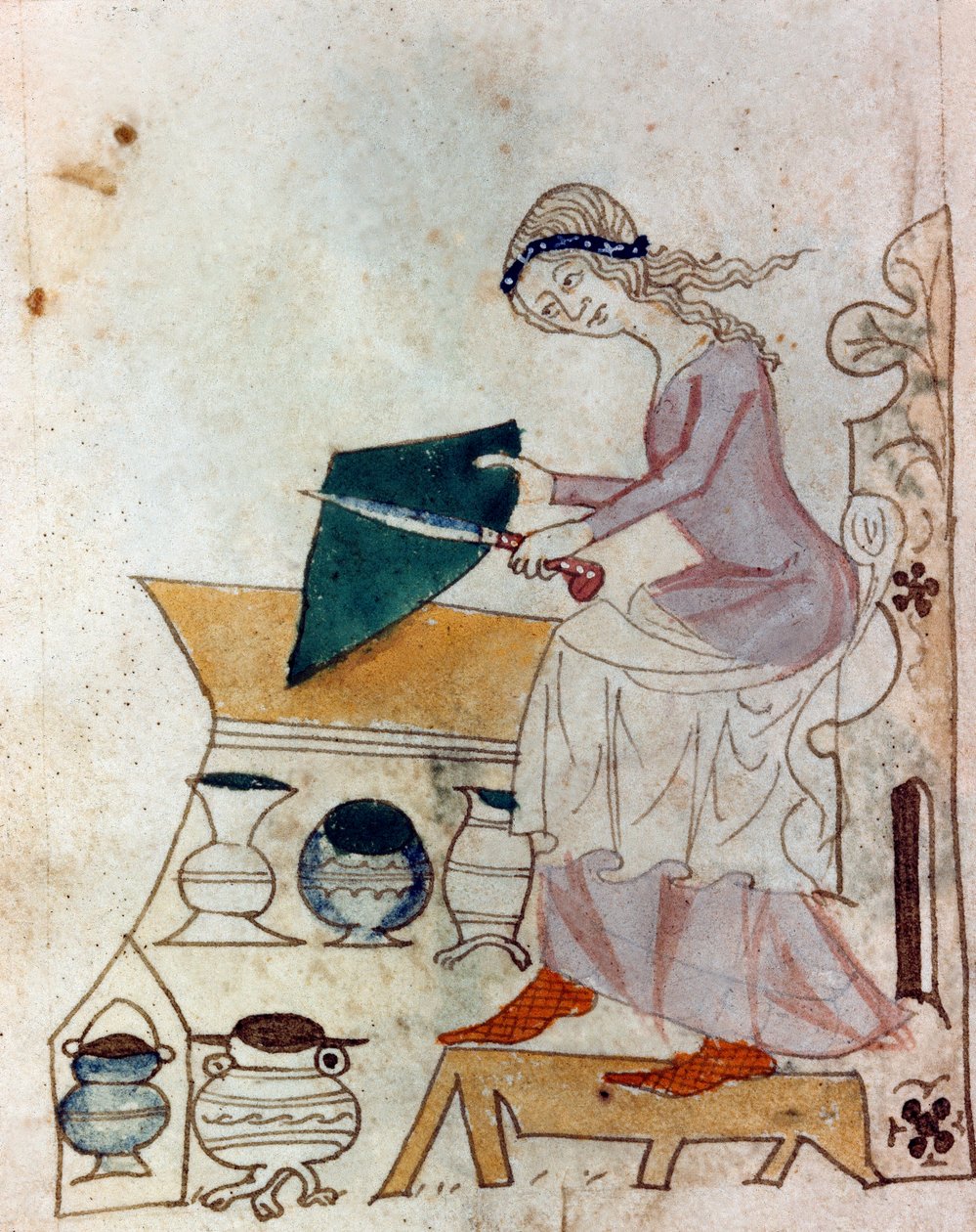 Una joven afilando un cuchillo. Miniatura tomada de un manuscrito provenzal 