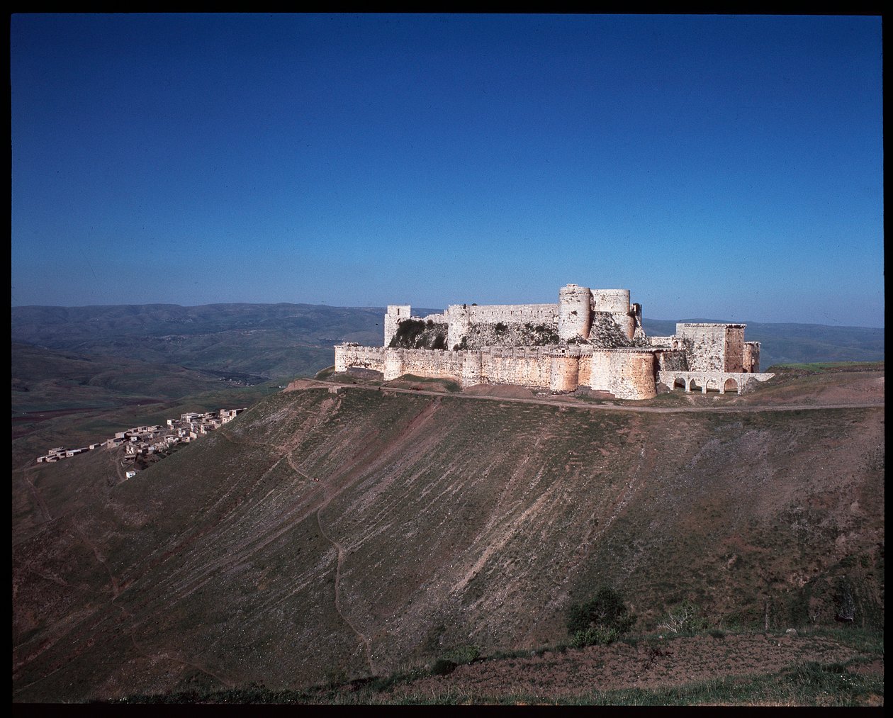 Vista del Krak de los Caballeros, castillo cruzado, c.1100 de Unknown artist