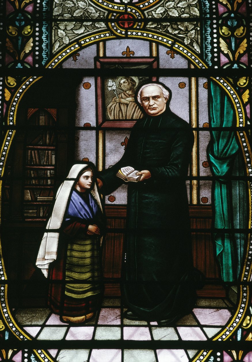Bernadette y el abate Peyramale, vidriera de la iglesia parroquial de Lourdes, Languedoc-Rosellón-Midi-Pirineos, Francia, siglo XX. de Unknown photographer