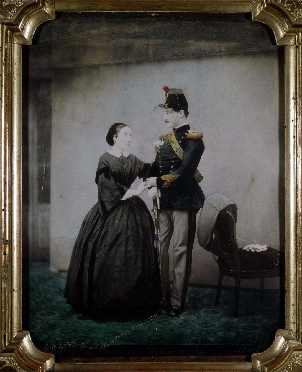 Fotografía coloreada de un oficial y su esposa que data de 1850. de Unknown photographer
