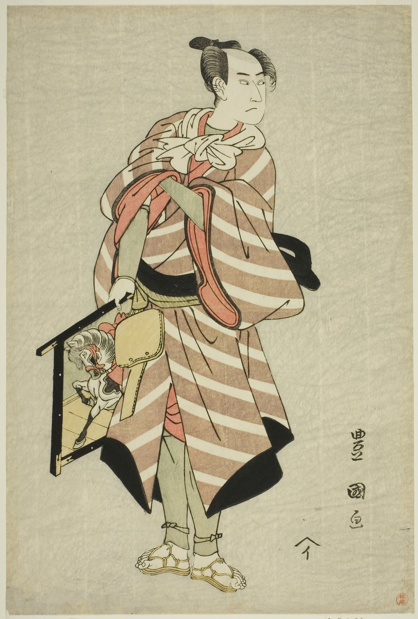 El actor Sawamura Sojuro III como el arriero Muchizo en la obra "Miyamairi Musubi no Kamigaki," representada en el Teatro Kiri en el undécimo mes, 1797 de Utagawa Toyokuni I