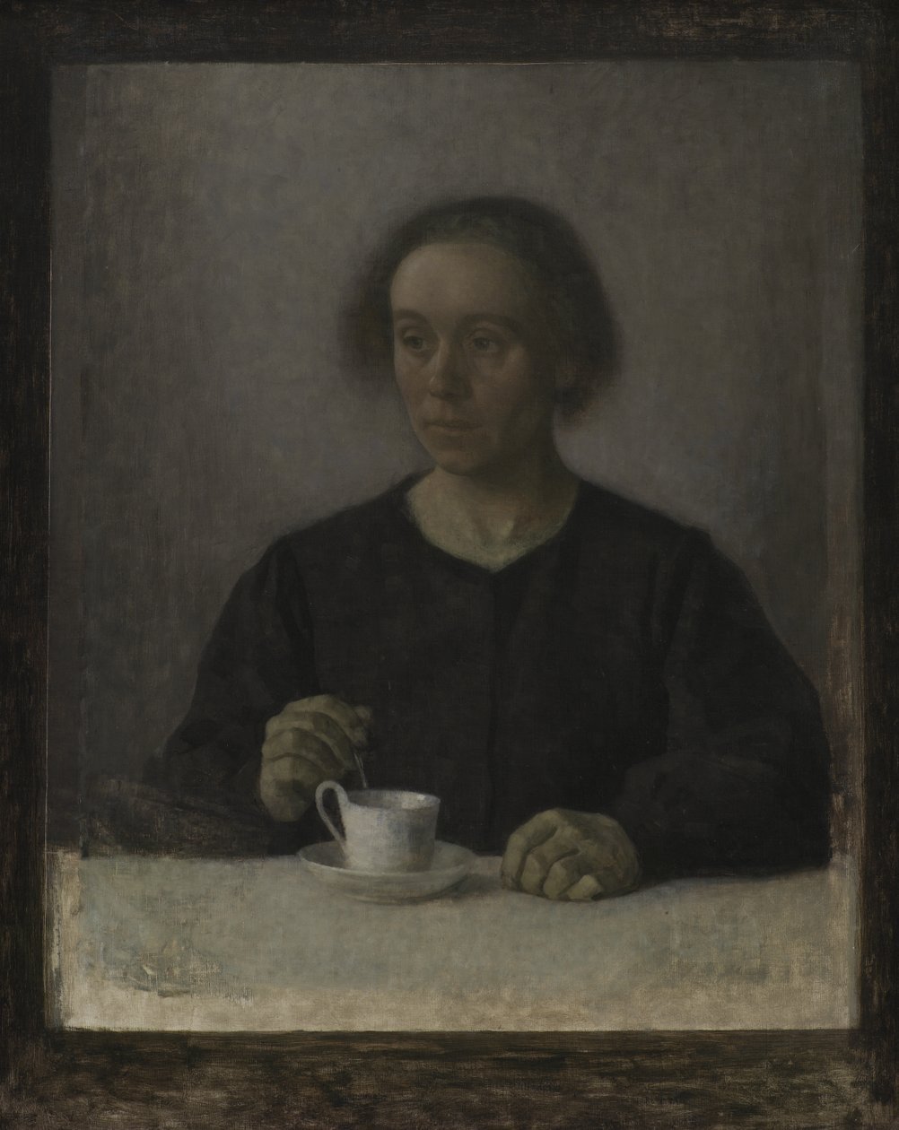 Ida Hammershøi, la esposa del artista, con una taza de té de Vilhelm Hammershøi
