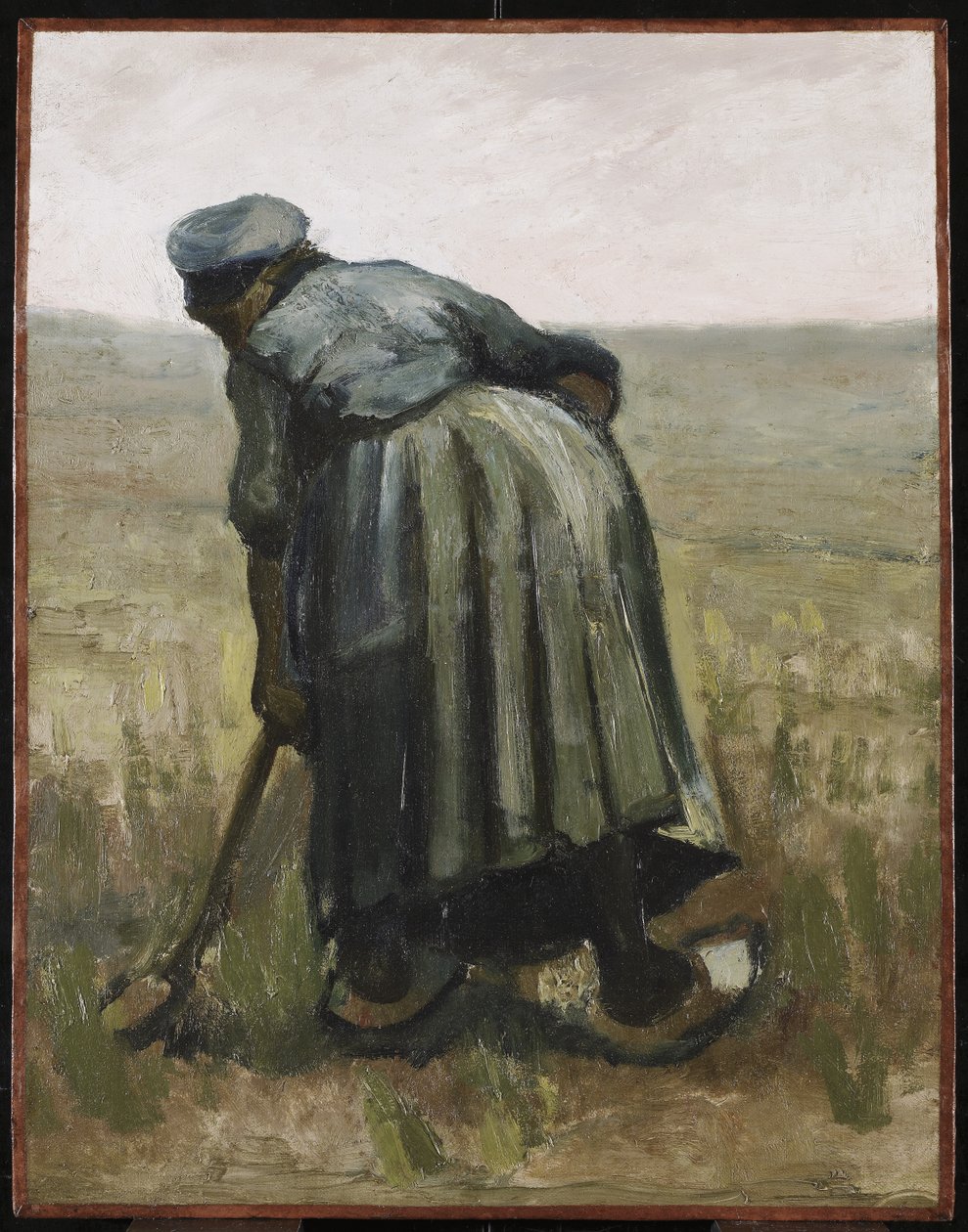 Una mujer con una pala, vista desde atrás, 1885 de Vincent van Gogh