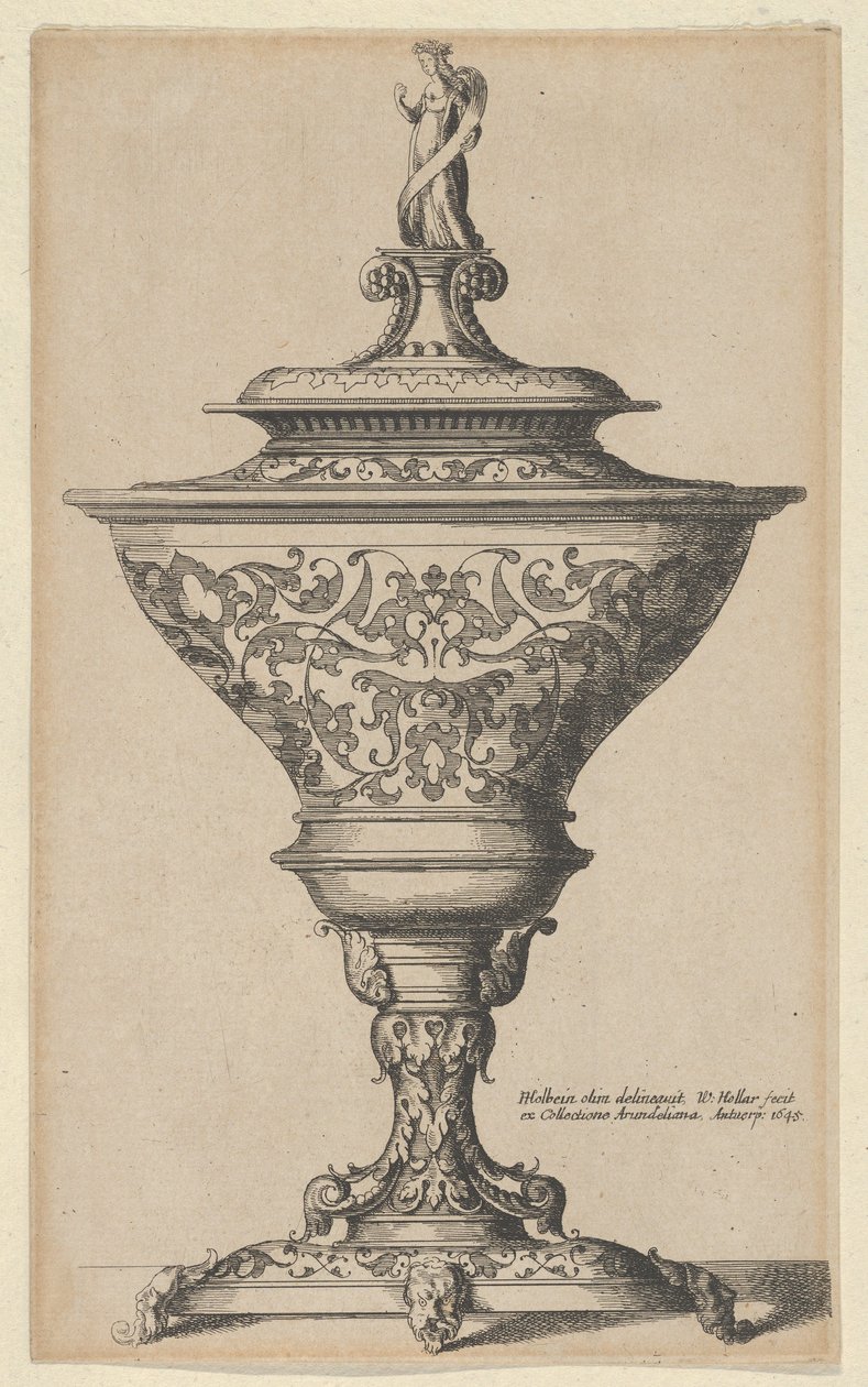 Copa ornamentada sobre pies de máscaras de Wenceslaus Hollar