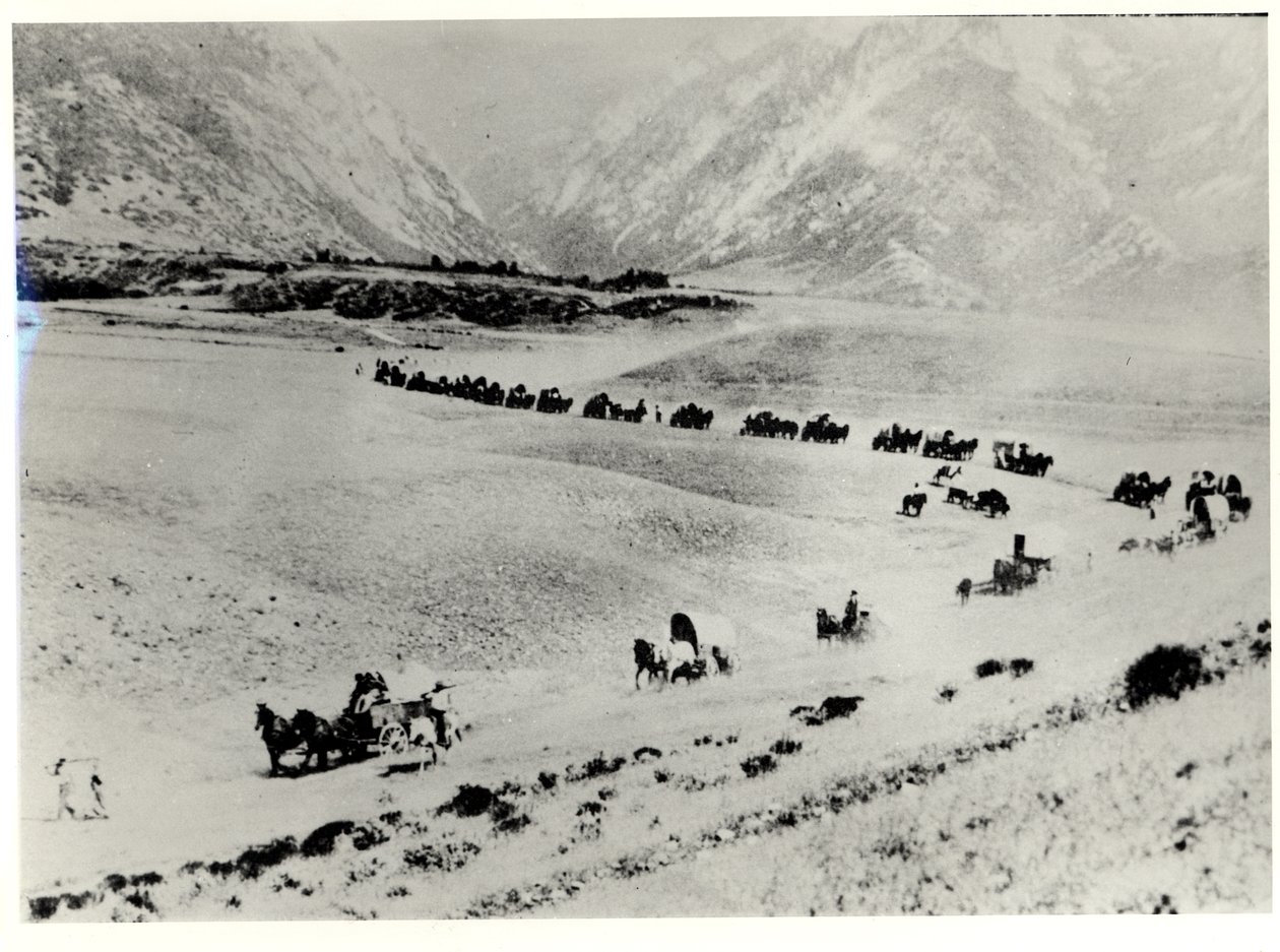 Pioneros recogiendo inmigrantes de la estación de tren y llevándolos a la Ciudad del Lago Salado Mormón de William Henry Jackson