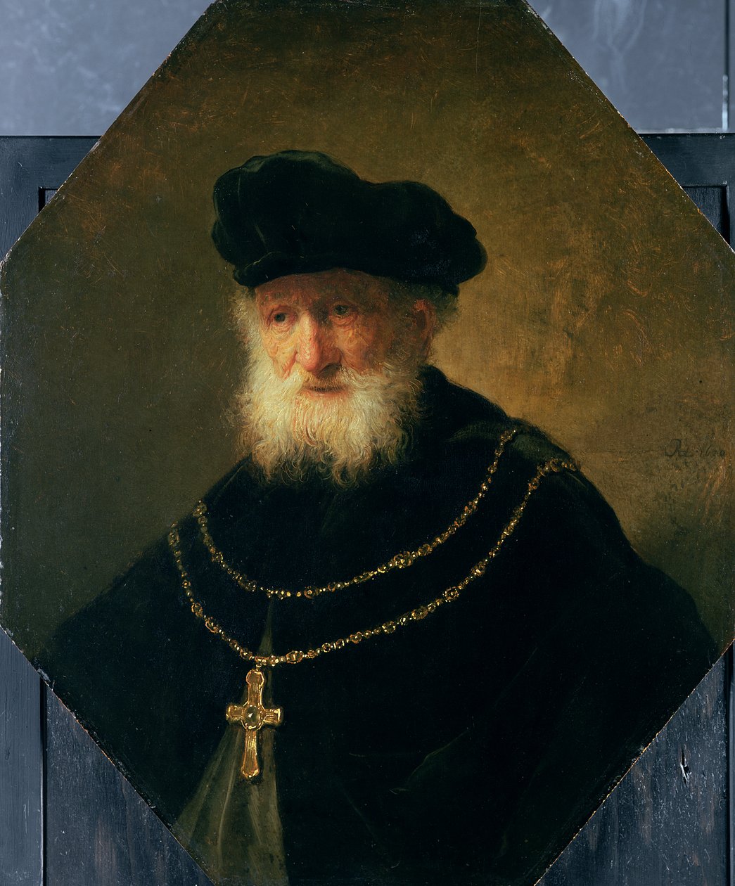 Cabeza de un anciano con una cruz, 1630 de studio of Rembrandt Harmensz. van Rijn