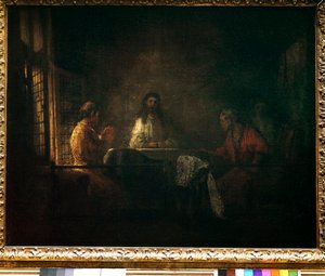 Los peregrinos de Emaús. Cristo aparece a los peregrinos sentados en una mesa en una posada en Emaús. Pintura del taller de Harmensz van Rijn dit Rembrandt (1606-1669)