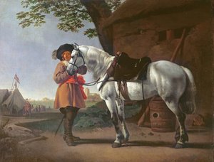 Un caballero con un caballo gris
