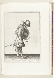 El ejercicio del escudo y la espiga: el soldado pone la espiga en el suelo junto a su pie derecho (n.º 16), 1618 El Nassausche Wapen-Handelinge, van Schilt, Spies, Rappier and the Targe: más allá de figuerlick representado, y enmarcado según el nuevo orden de Adam van Breen