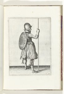 El ejercicio del escudo y la espiga: el soldado de pie con la espiga apoyada en el suelo junto al pie derecho (n.º 30), 1618 El Nassausche Wapen-Handelinge, van Schilt, Spies, Rappier and the Targe: más allá de figuerlick representado, y enmarcado según el de Adam van Breen