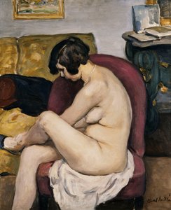 Desnudo en un sillón rojo