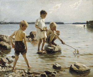 Niños jugando en la orilla
