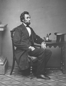 Abraham Lincoln, retrato de cuerpo entero, sentado, 1861
