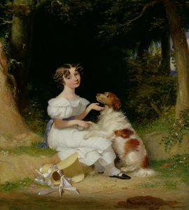 Una niña con su Spaniel
